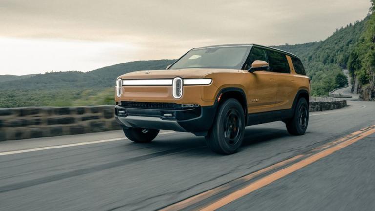 2023 Rivian R1S in mustard yellow.